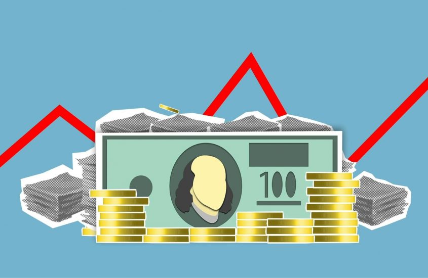 cardboard-illustration-of-paper-money-and-coins-on-blue-background